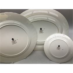 Wedgwood tea and dinner service decorated in the ‘April Flowers’ pattern, to include nine bowls, seven teacups and saucers, three coffee cups and saucers, sauce boat and stand, lidded tureen, covered sucrier and another smaller, oval serving plate, twelve side plates, teapot, four dinner plates, jug and shallow bowl