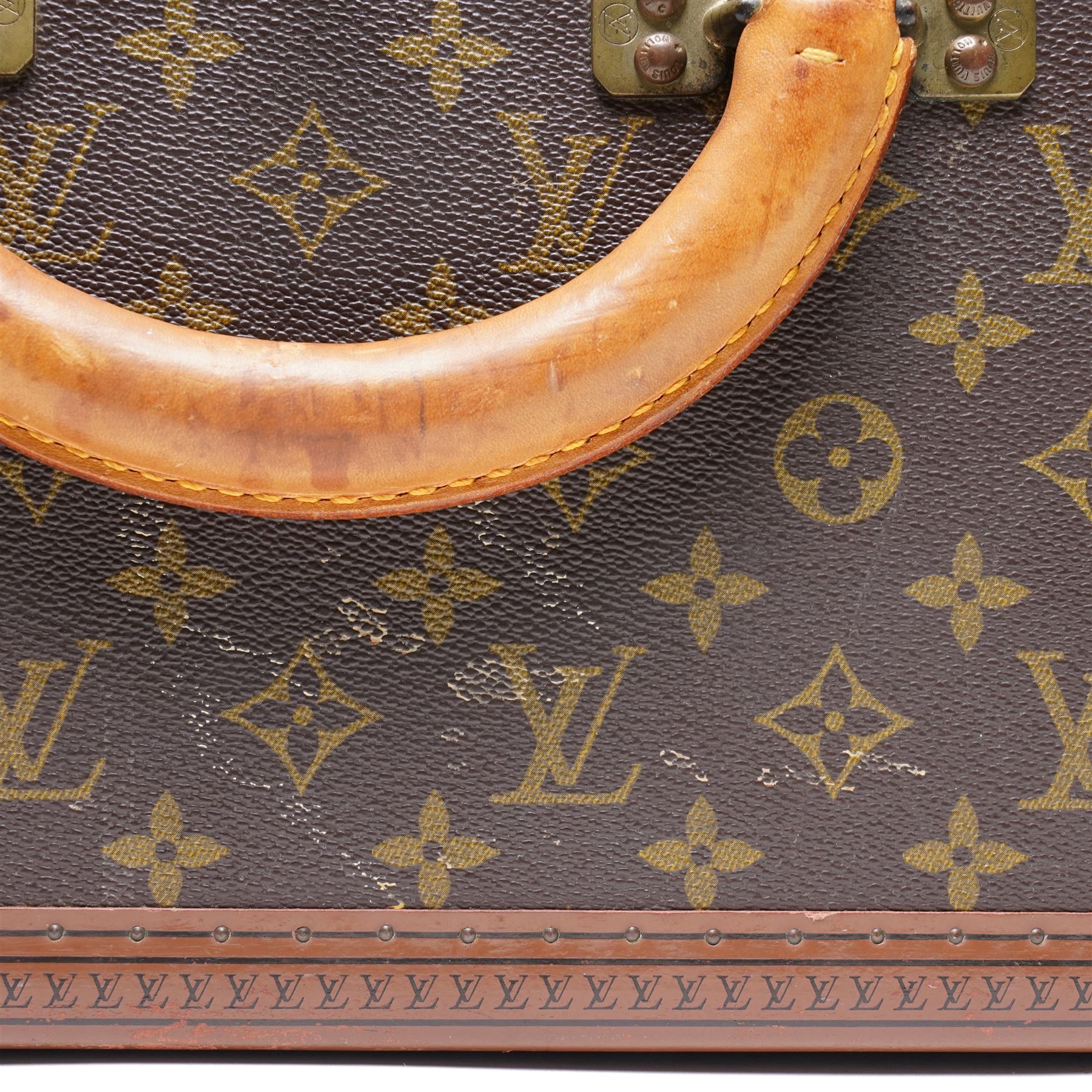 Mid-20th century Louis Vuitton monogram cabin trunk,  monogram canvas with lozine trim and brass mounts, single front leather handle with lock stamped Louis Vuitton with key code 1080701, the interior fitted with original webbing straps and lift-out tray, label to lid printed 'Avenue Marceau 78bis - Paris Nice - 2 Avenue de Suède' serial number 953998, circa1960s, with original key present
