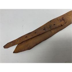 Saudi Arabian khanjar dagger with 29.5cm curving double edged  steel blade; white metal and copper mounted horn grip; in white metal mounted brass and leather scabbard incorporating embroidered leather wearing strap