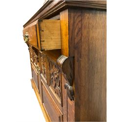 Edwardian oak mirror back sideboard, raised shaped pediment carved with acanthus leaves over Greek key frieze, bevelled mirror back, fitted with two drawers and two cupboards