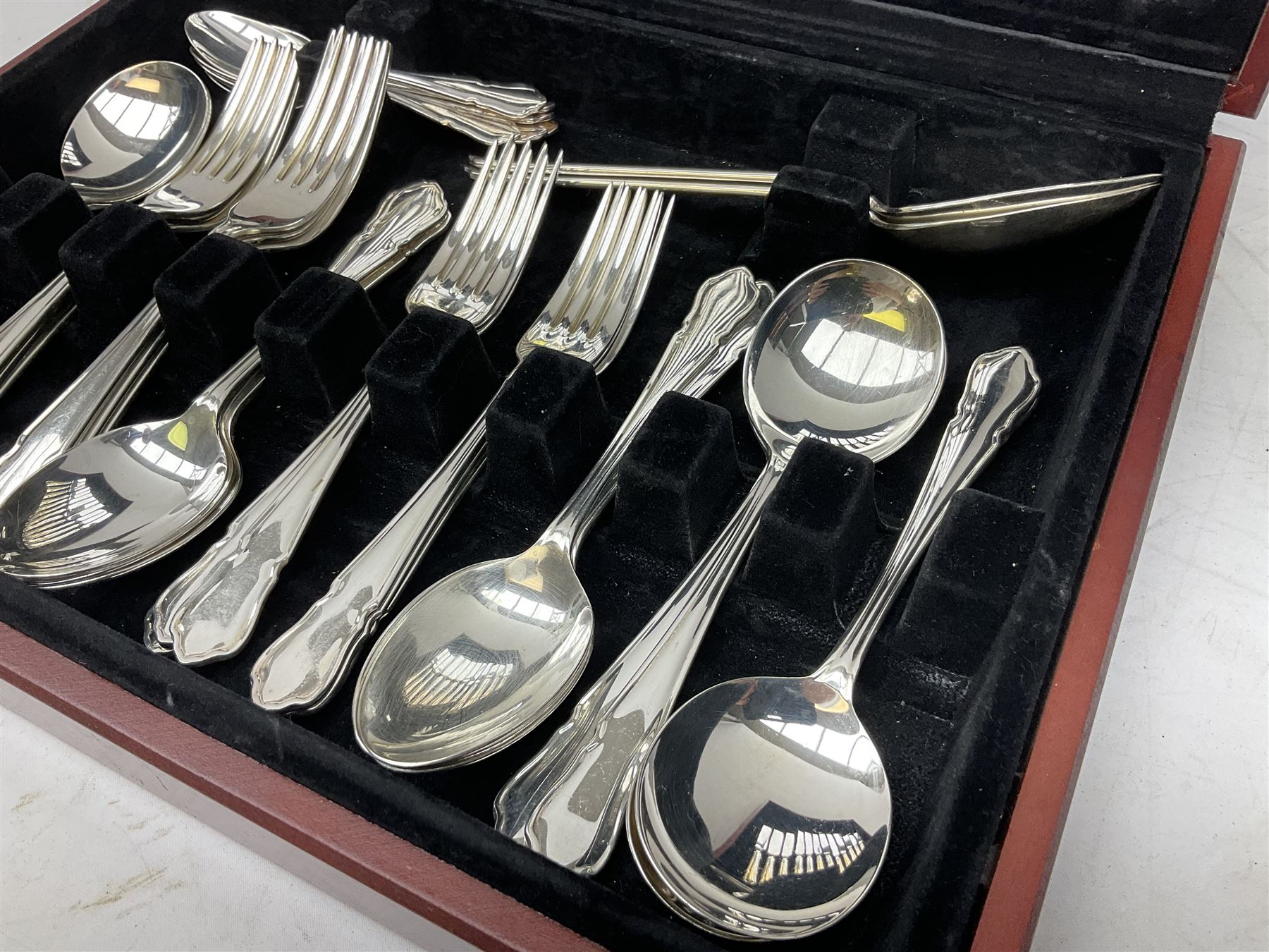 Canteen of Sheffield silver-plated cutlery by John Stephenson, six settings, cased, L38cm