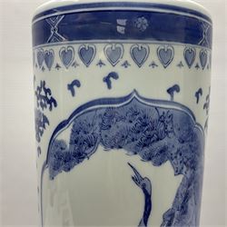 Blue and white umbrella stand, decorated with panels of birds amongst flowers and foliage, with four character mark beneath, H61.5cm