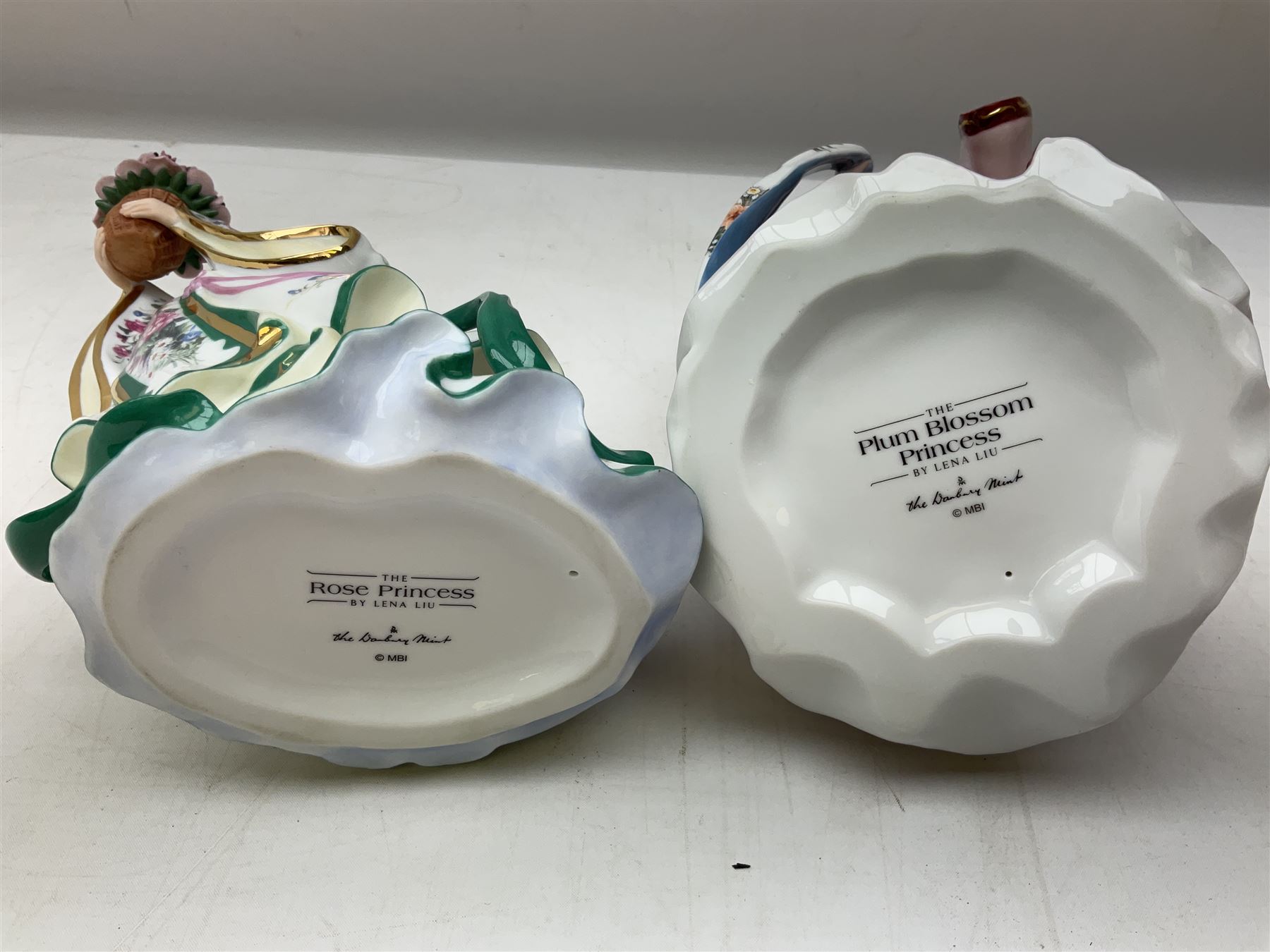 Five Danbury Mint Princess figures by Lena Liu, comprising Harp Princess, Plum Blossom Princess, Chrysanthemum Princess, Rose Princess and Iris Princess, one with certificate, all with marks beneath
