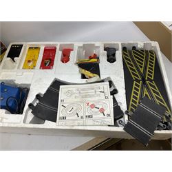 Scalextric - Porsche Power Set; boxed; Subaru Competition Rally Set (track and controllers only); boxed; Formula 1 Racing Car Set; polystyrene box base only; together with large quantity of track in four boxes; and quantity of accessories including vehicles, part vehicles for spares or repair, fencing, bridge, spare controllers etc