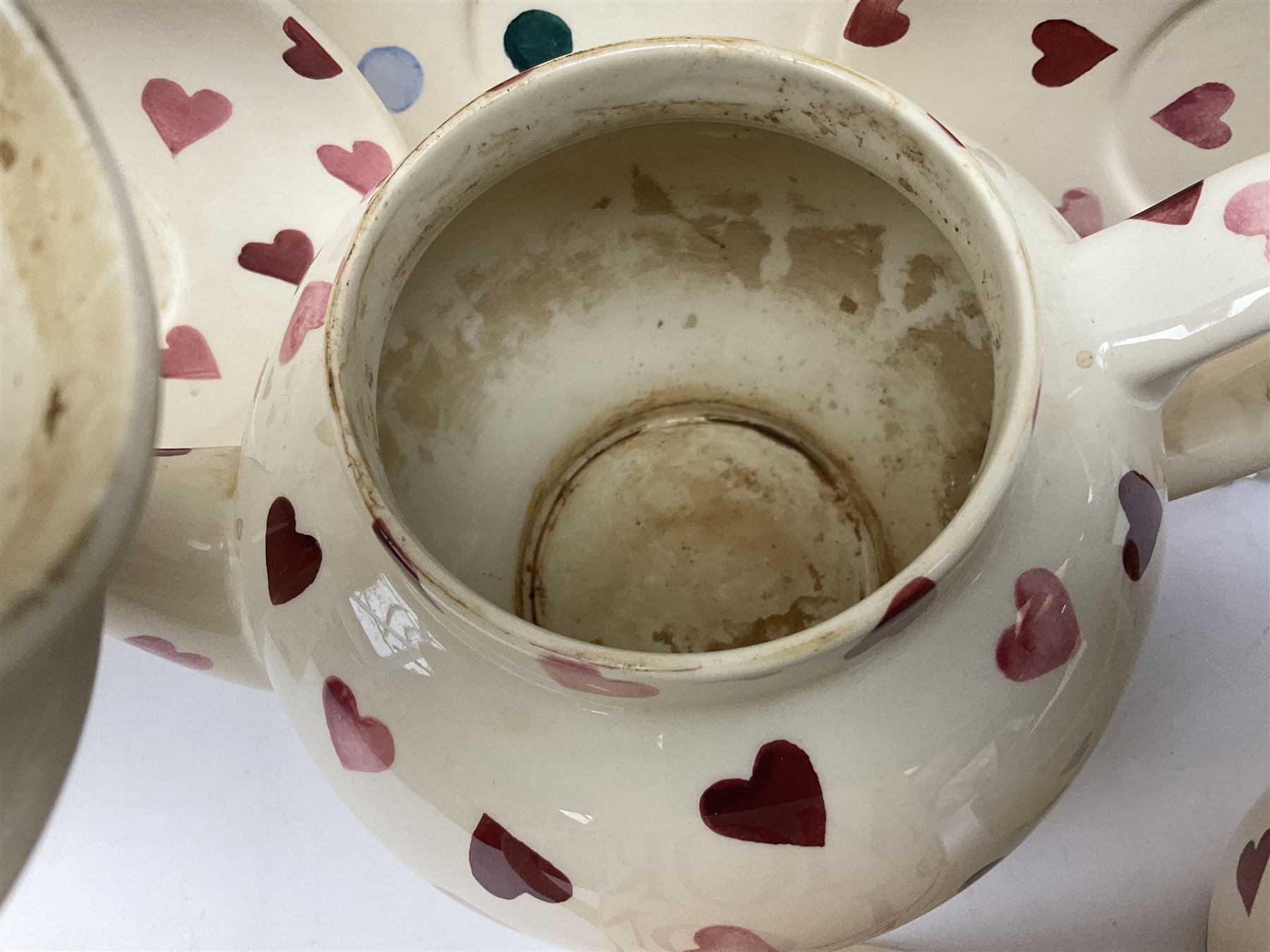 Collection of Emma Bridgewater spongeware ceramics, to include Pink Hearts pattern teapot, milk bottle vase, teacup and saucers, Love & Kisses sugar shaker and large 'I love you more than Marlon Brando' mug, British Birds and Black and White pattern mugs, etc, all with printed marks beneath, tallest H21.5cm