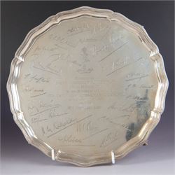 1930s silver salver, of circular form with beaded pie crust rim and upon four claw and bal...