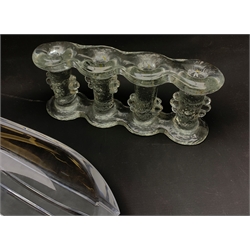 RTV- An unusual Pukeberg Art Glass candelabra, modelled as four clear glass knopped stems joined at the base and rim, L28.5cm, together with a Villeroy & Boch glass dish, of egg form with reeded base, L35cm. 