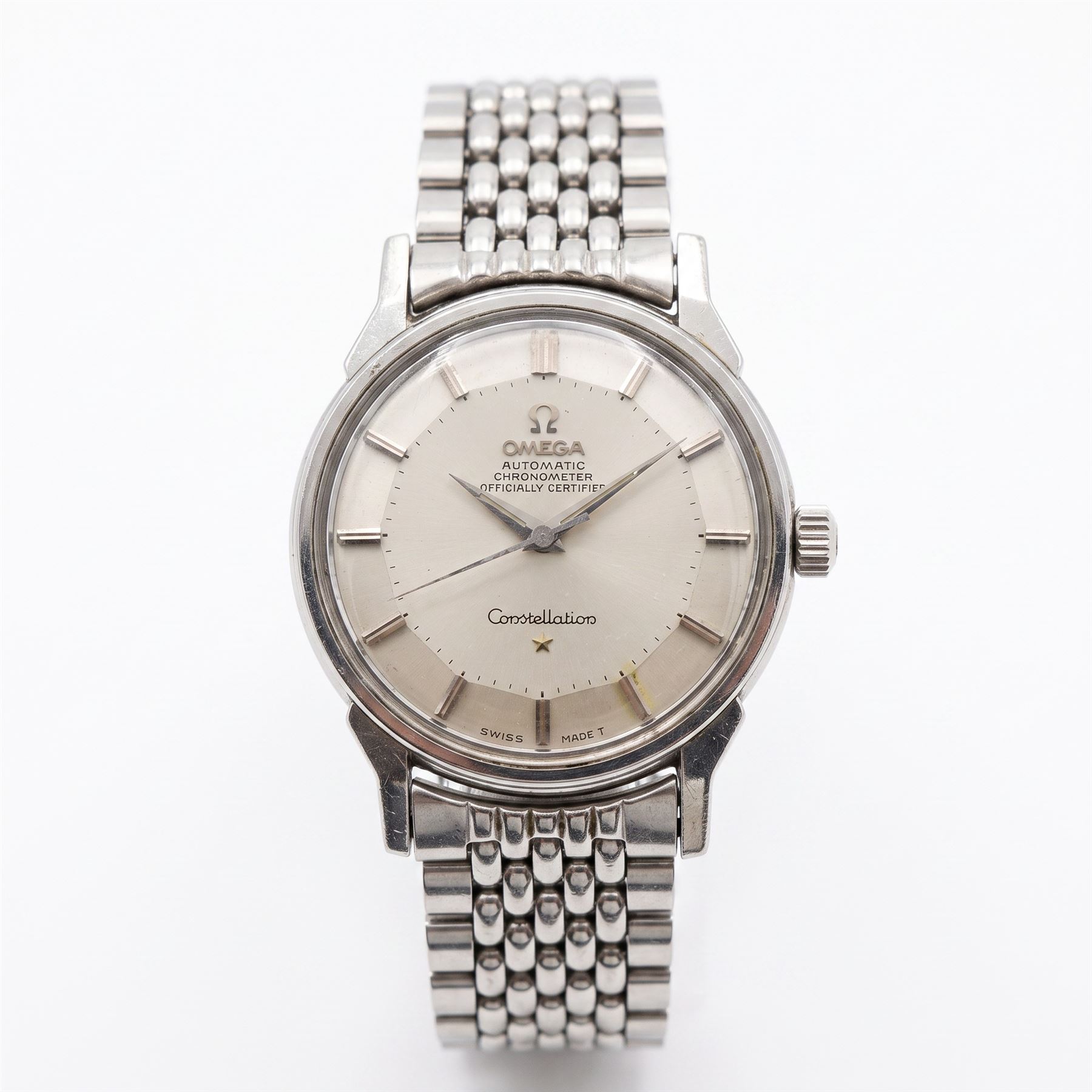 Omega Constellation gentleman's stainless steel automatic chronometer wristwatch, circa 1966, Ref. 166.033, serial No. 24823381, silvered pie-pan dial with baton hour markers, on Omega stainless steel bracelet, with fold-over clasp, with guarantee