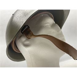 Two 1960s East Block Soviet style helmets - Czechoslovakian and Russian; both with liners (2)