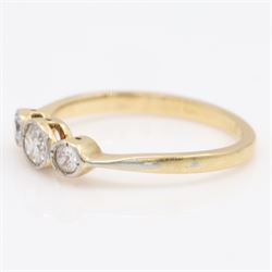 Early 20th century gold diamond ring, milgrain set with three old cut diamonds, stamped 18c Plat, total diamond weight approx 0.25 carat