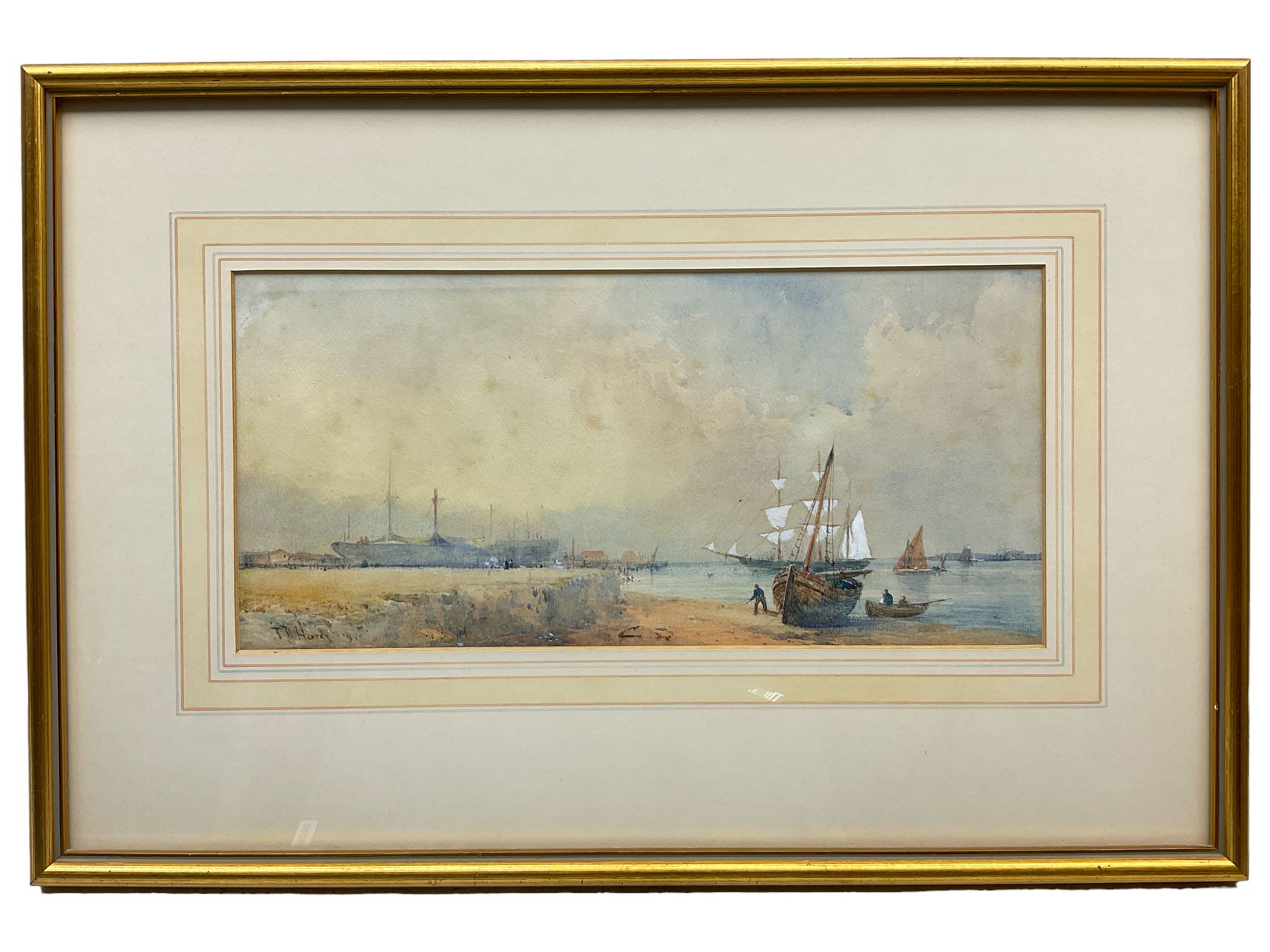 After Thomas Bush Hardy (British 1842-1897): Beached Ship and Figures near Dock, watercolour signed 'T B Hardy' 16cm x 34cm