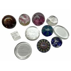 Assorted glass paperweights, to include a millefleur example with polychrome floral canes, two Caithness examples, etc
