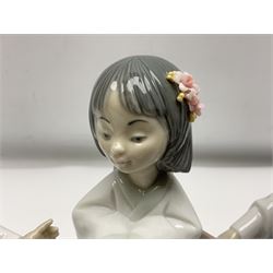 Six Lladro figures of the China doll set and Oriental doll set, comprising Playing the Flute no.6150, Bearing Flowers no.6151, Flower Gazer no. 6152, Oriental Dance no. 6230, Oriental Lantern no. 6231 and Oriental Beauty no. 6232, largest H20cm