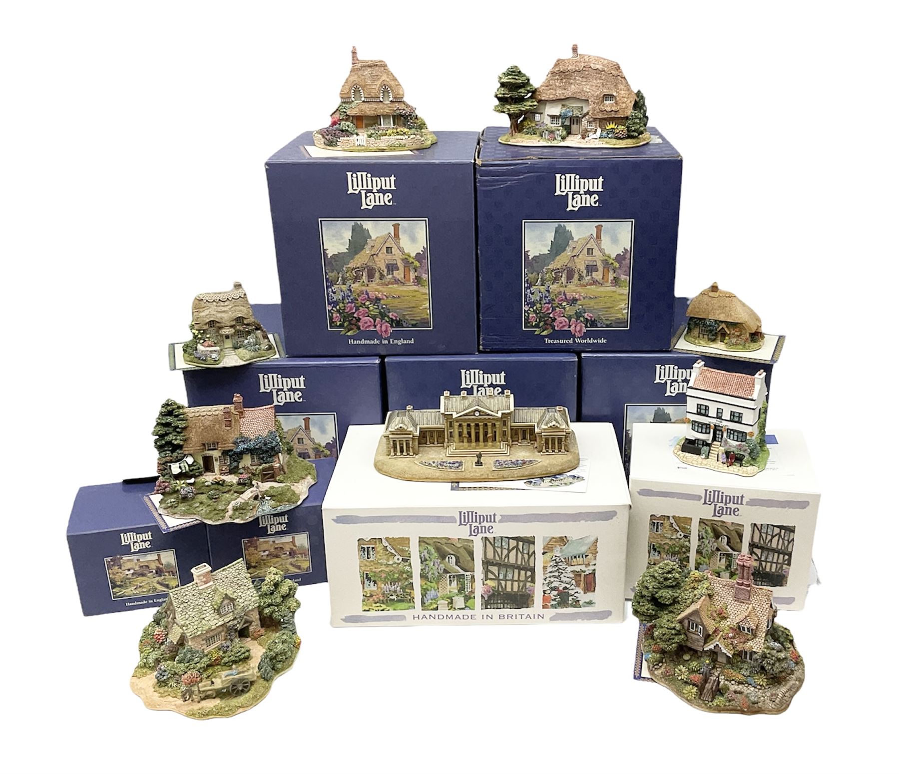 Eight Lilliput Lane models, including Gertrude's garden, Cruck End, Honeysuckle cottage, The Pottery, Huddersfield Railway Station, The Magpie Cafe, Amberly Rose, Summer Days and Shades of Summer, all boxed with deeds