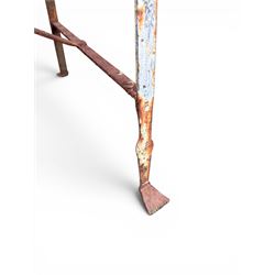 Regency period wrought iron strapwork garden bench, cresting rail with central Scottish thistle motif and flanking pediments, in distressed blue painted finish