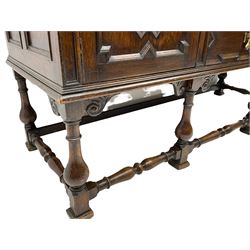 Early 20th century oak sideboard, fitted with two drawers and two cupboards, on turned supports joined by turned stretchers