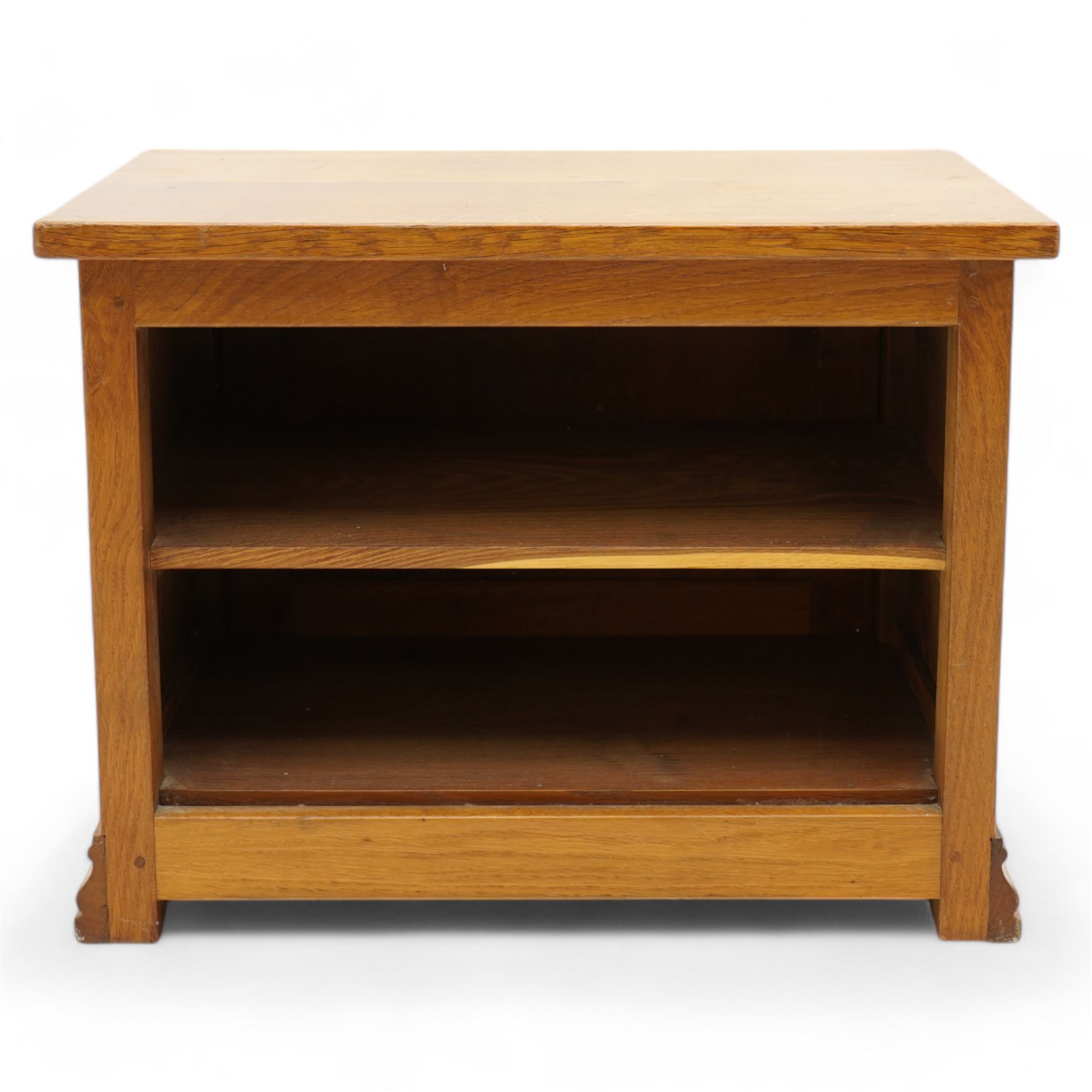 Beaverman - oak media stand, rectangular top over panelled hinged front fitted with Yorkshire rose carved handles, on moulded skirt base, carved with beaver signature, by Colin Almack, Sutton-under-Whitestone Cliffe, Thirsk