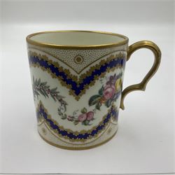 Sèvres soft paste porcelain coffee can and saucer with date code for 1767, painted with floral and laurel leaf garlands within blue scalloped and gilt borders, interlaced LL monogram enclosing the date letter O above painters mark for Catrice, coffee can H7.5cm, saucer D15cm