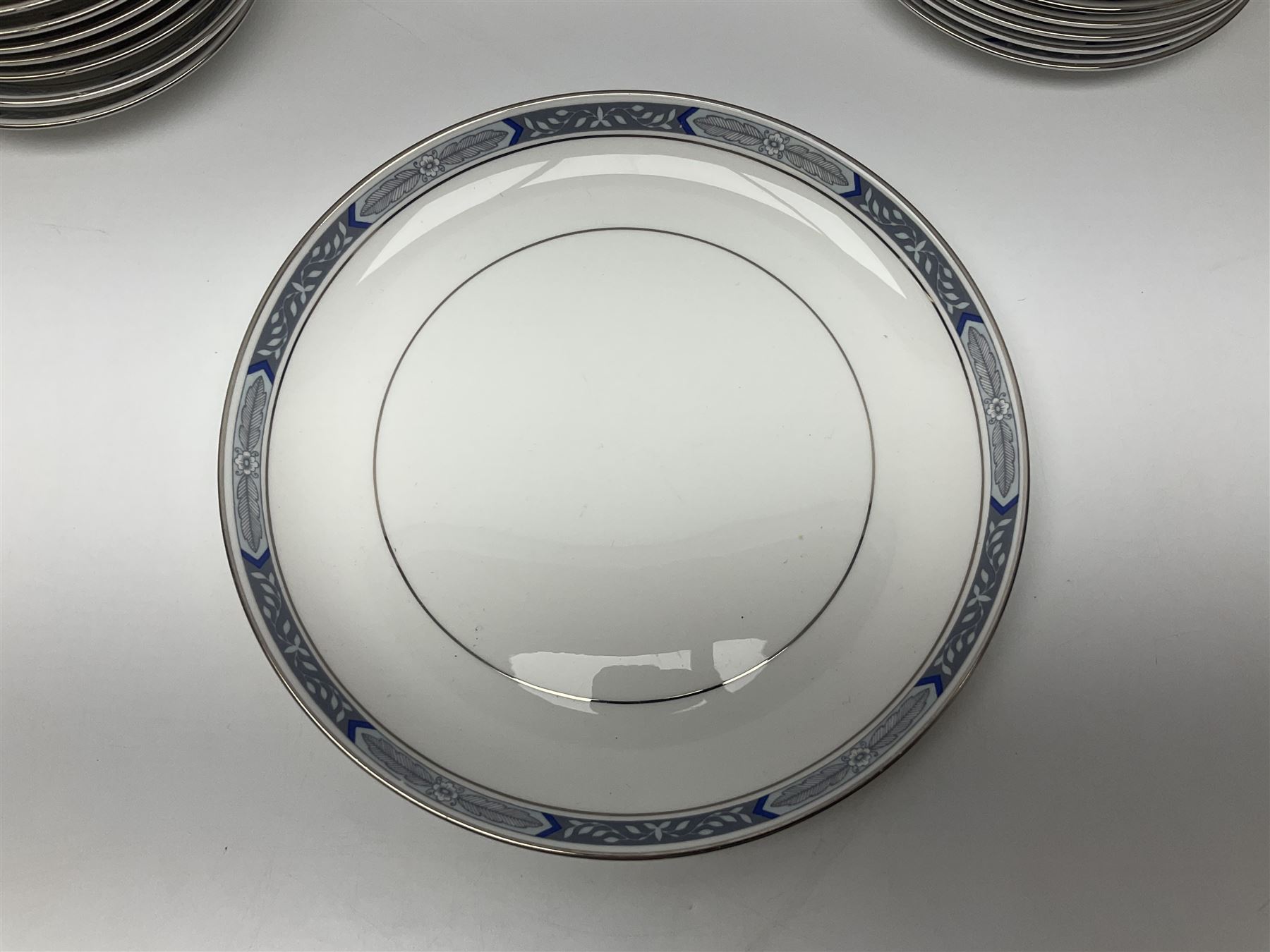 Royal Worcester Beaufort tea service, comprising teapot, milk jug, open saucier, eleven teacups, twelve saucers, eight dessert plates and one cake plate