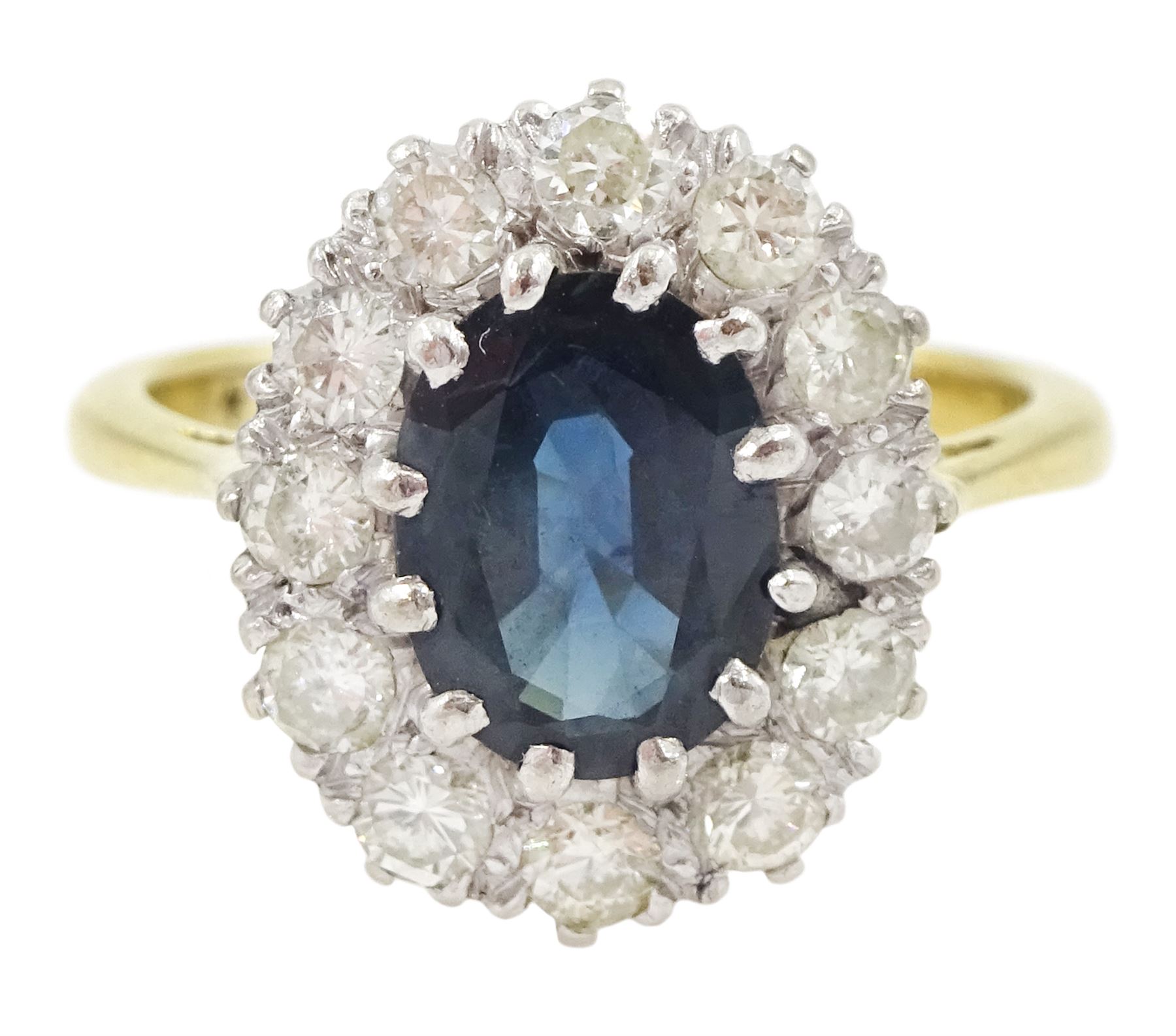 Gold oval cut sapphire and round brilliant cut diamond cluster ring, stamped 18ct, sapphire approx 1.50 carat, total diamond weight approx 0.60 carat