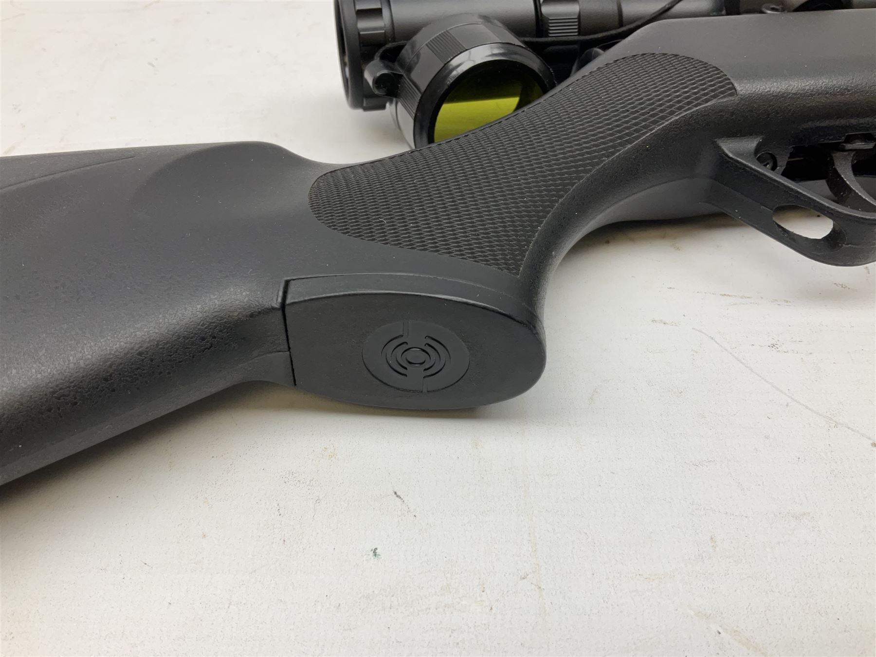 Stoegar .177 air rifle with break barrel action, 3 x 9 telescopic sight and fully integrated sound moderated barrel, no visible serial number, L109cm; in Stoeger lined gun sling