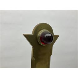 Brass alter cross, decorated with glass cabochons, upon a acicular stepped base and three claw feet, H73cm 