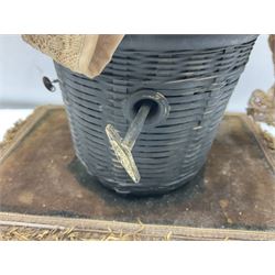 Modern reproduction automaton in the form of a baby doll in a basket clothed in Victorian style lace bloomers and frilled bonnet; clockwork action; on raised platform; with French paper label on base, 29cm wide,