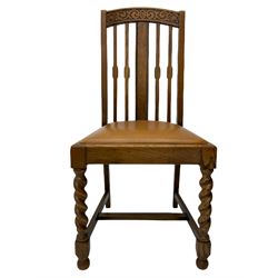 Set of four early 20th century oak dining chairs, the cresting rails decorated with applied blind fretwork decoration, leather drop in seats, on spiral turned supports