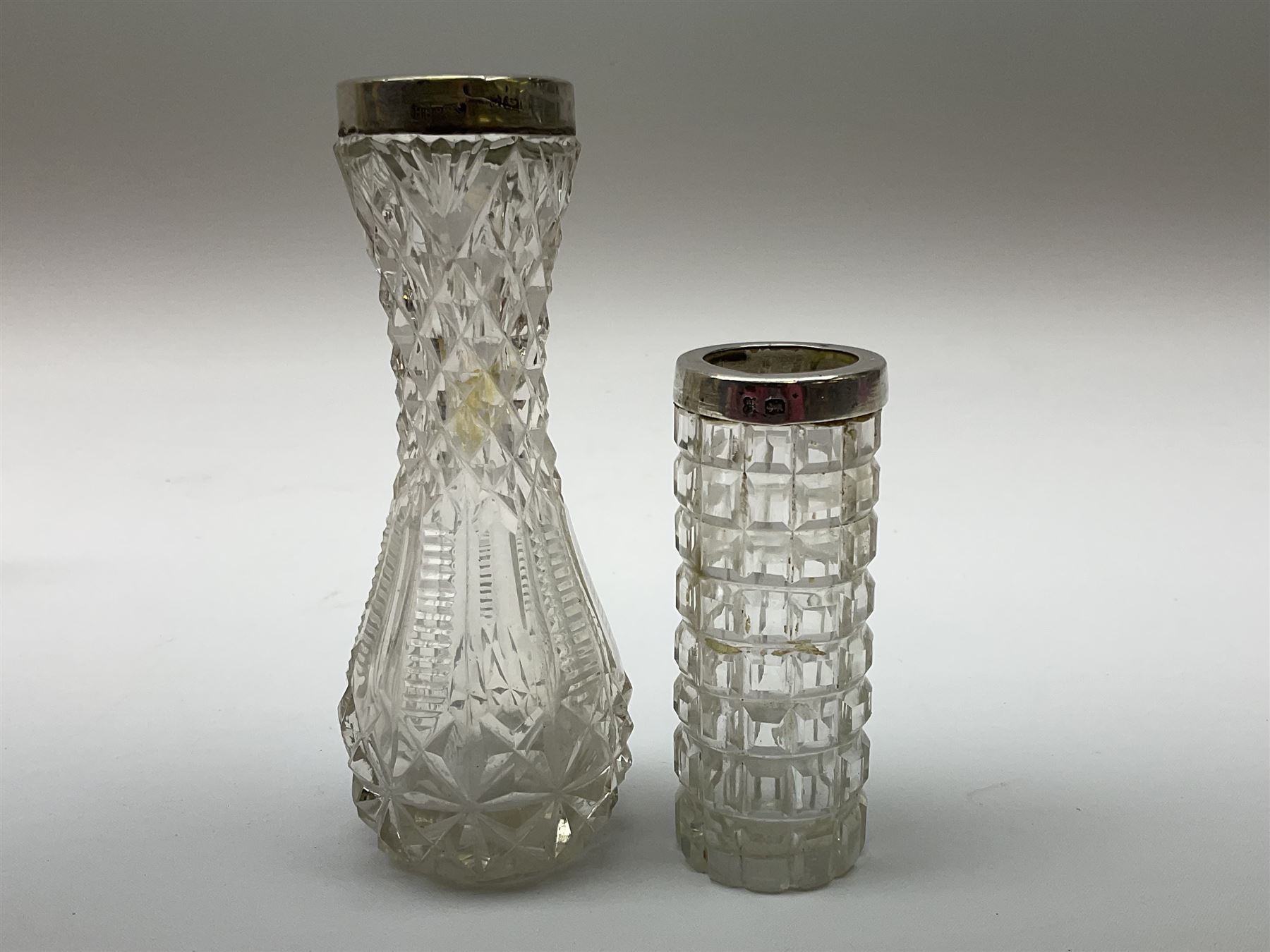 Group of silver mounted glass scent bottles and crested ware, together with a Brierglass lead crystal box with a glass and silver, lid, etc all silver with various hallmarks. 