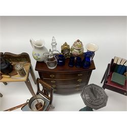 Collection of miniature dolls house furniture and accessories, to include long case clock, chest of drawers, tiled wash stand, ceramics and glass ware, mirror, baskets, etc 