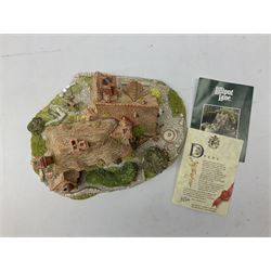 Two limited edition Lilliput Lane cottages, comprising Oakwood Smithy and Blair Athol, both boxed with deeds