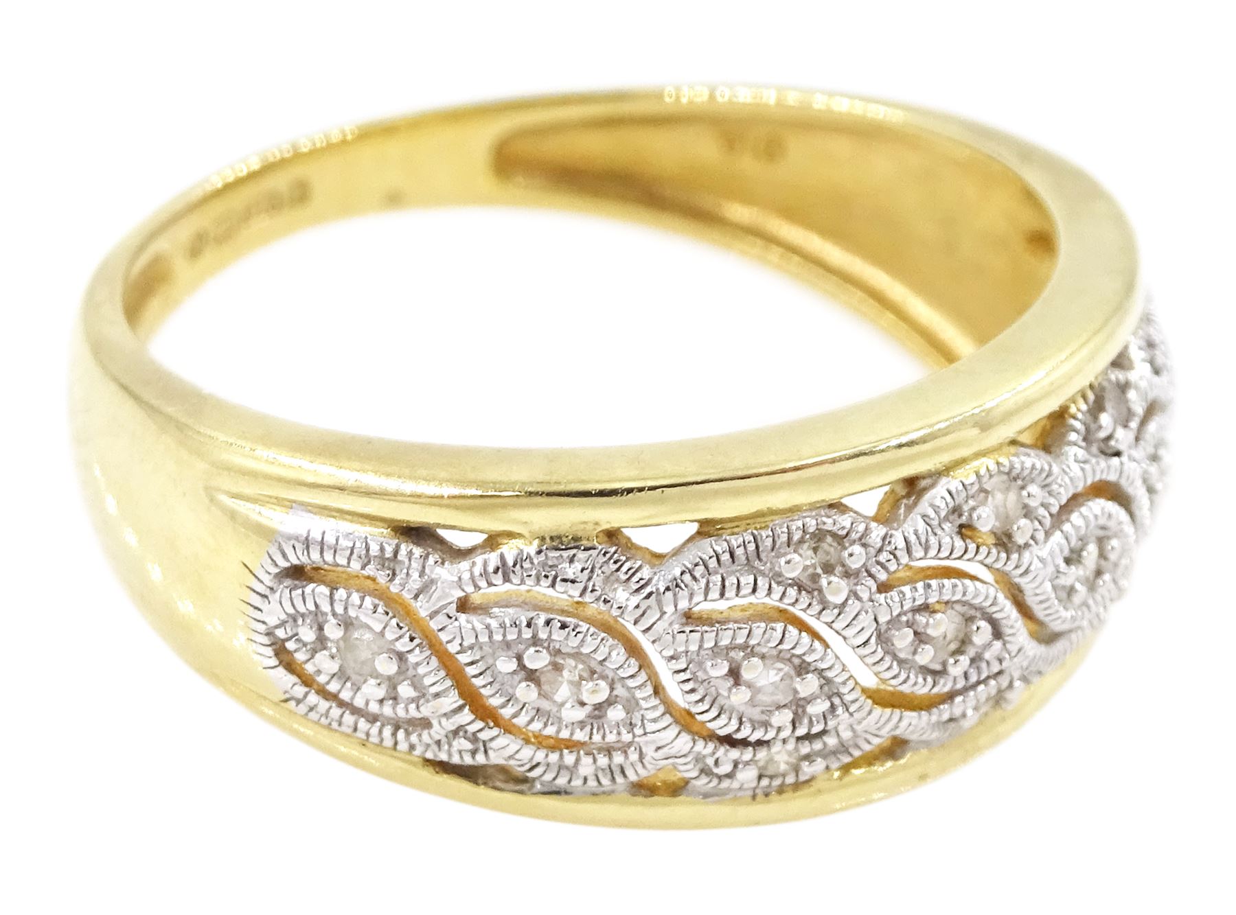 9ct gold diamond ring, milgrain set diamond chips, in a fancy openwork setting, hallmarked