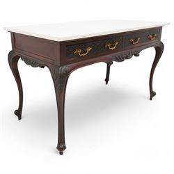 Late Victorian mahogany washstand, rectangular pale granite top over two drawers, the drawer front decorated with blind fretwork and ornate gilt cast metal handles, shaped apron carved with curled foliage, on acanthus carved cabriole supports 