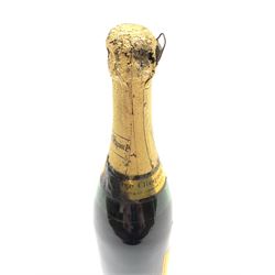One bottle of Veuve Clicquot Ponsardin 1947 dry champagne, foil seal partially damaged, level below label