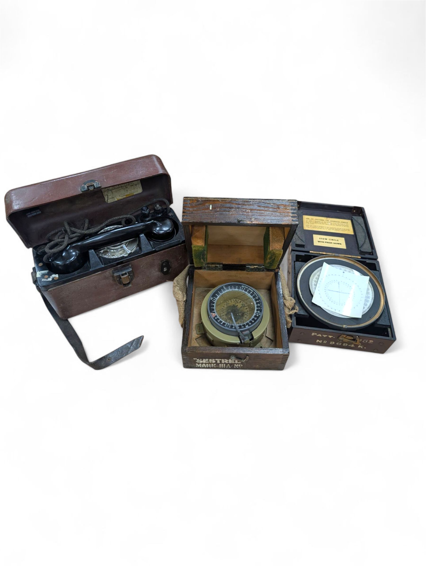 Azimuth Circle no. 1152, Sestrel Mark IIIA compass in wooden case and a field telephone