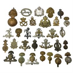 Nineteen Yeomanry metal cap badges inclu