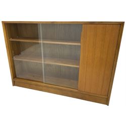 Gibbs Furniture - mid-to-late 20th century teak sideboard, enclosed by two sliding glass doors and single cupboard
