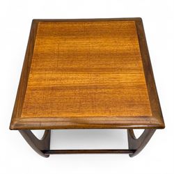 G-Plan - 'Astro' mid mid-century long teak coffee table with two nesting tables, rectangular top with outer banding, above two square top occasional tables on U-shaped end supports united by a stretcher