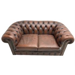 Chesterfield two seat sofa, upholstered in brown buttoned leather