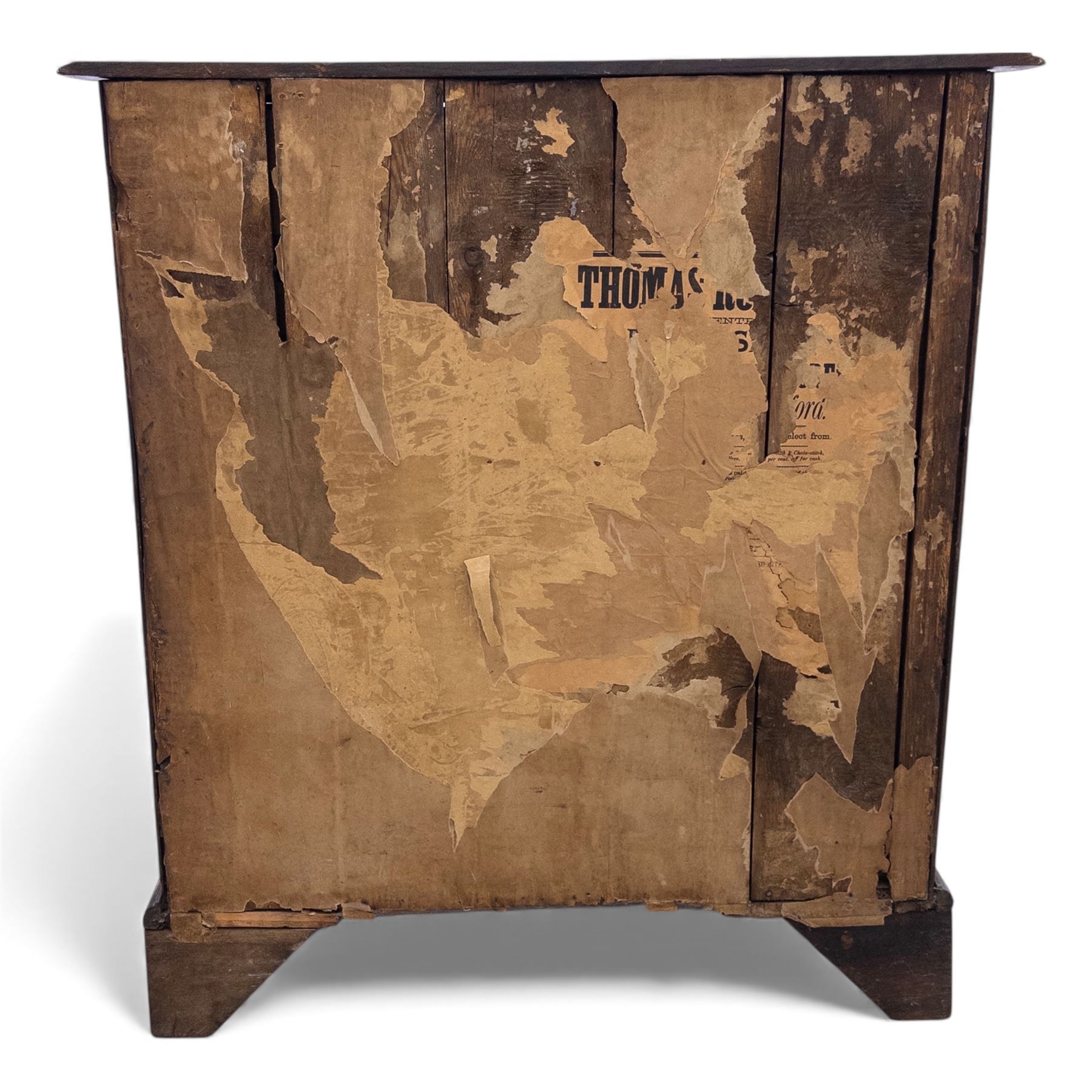 18th century oak chest, the rectangular top above an arrangement of two short over three long drawers fitted with brass batwing handles and escutcheons, raised upon shaped bracket feet