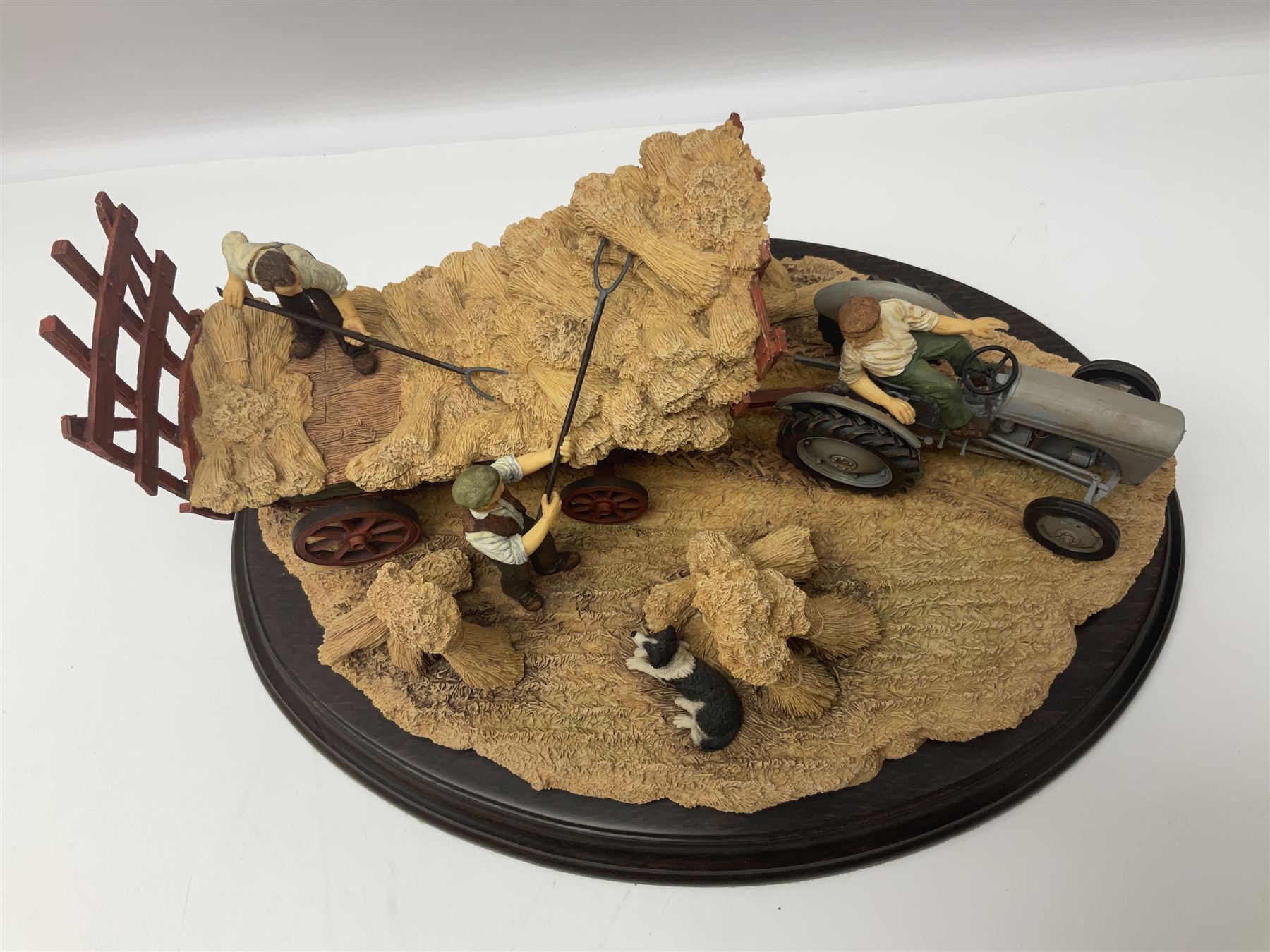 Two Country Artists figures, After the storm no CA831, limited edition 891/1750 and The Harvesters, limited edition 824/850, both with wooden base and certificates of authenticity