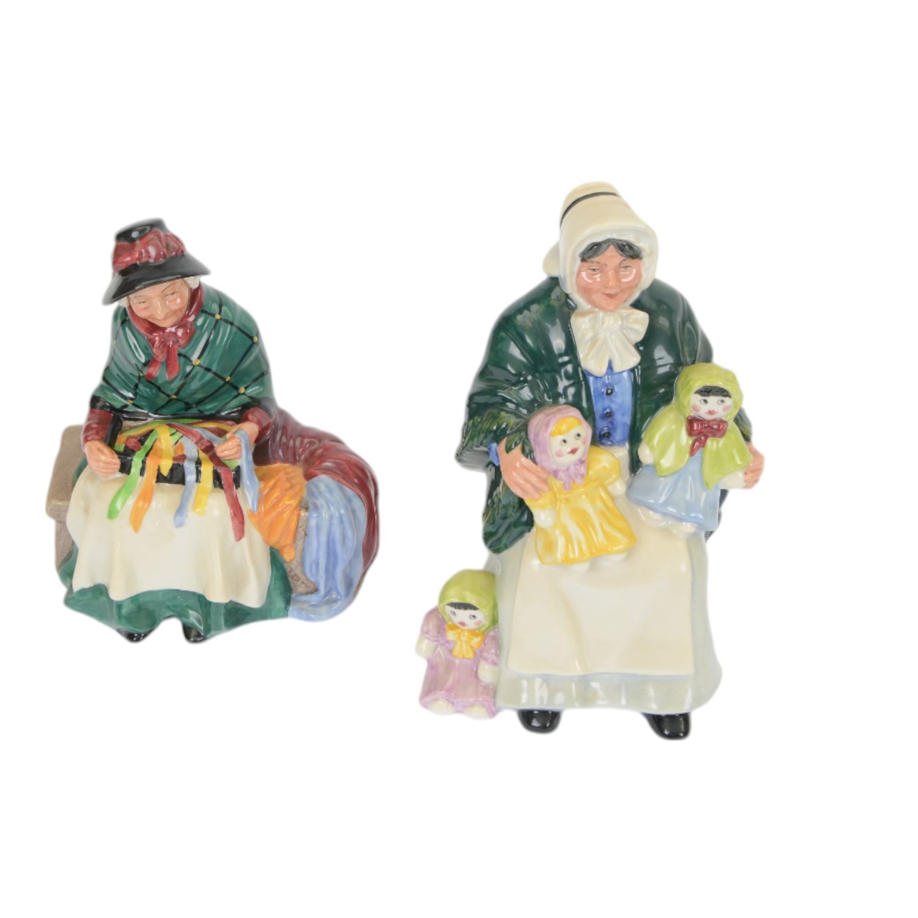 Five Royal Doulton figures, comprising Balloon Girl HN2818, The Rag Doll Seller HN2944, Silk and Ribbon HN2017, Good Day Sir HN2896 and Jemma HN 3168