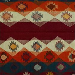 Southwestern Persian Jajim kilim, flat woven in bold bands of crimson, orange, cream, and indigo, decorated with rows of hooked diamond and star motifs 