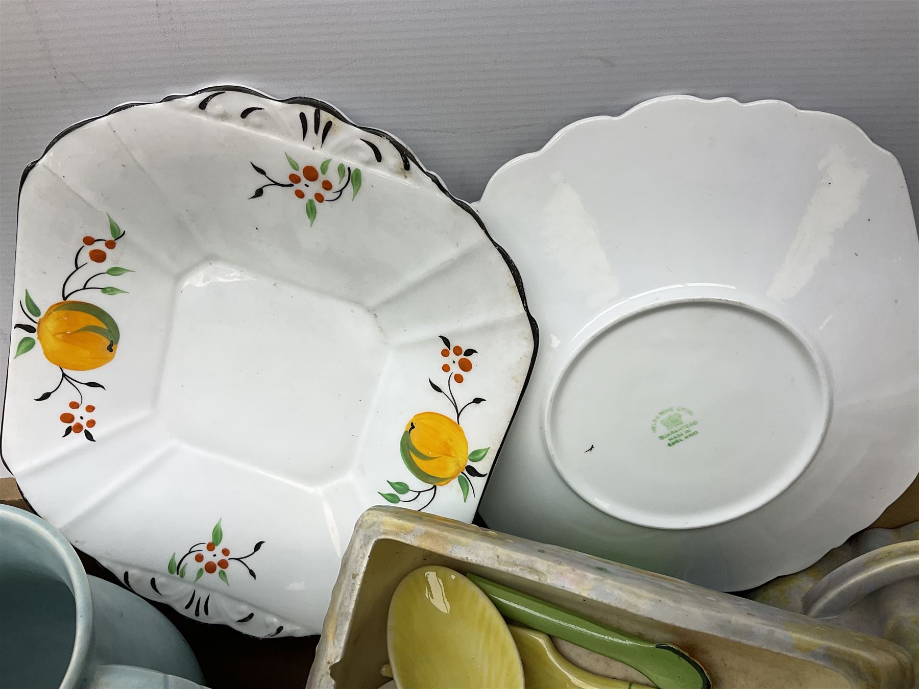 Two Beswick jugs decorated with palm trees, together with matching wall pockets, and similar ceramics, together with six Shelley dishes  