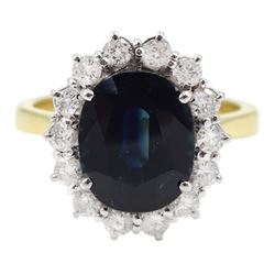 18ct gold oval sapphire and round brilliant cut diamond cluster ring, hallmarked, sapphire approx 2.85 carat, total diamond weight approx 0.90 carat
