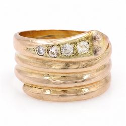 19th / early 20th century 9ct gold diamond coiled snake ring, the head set with four gradu...