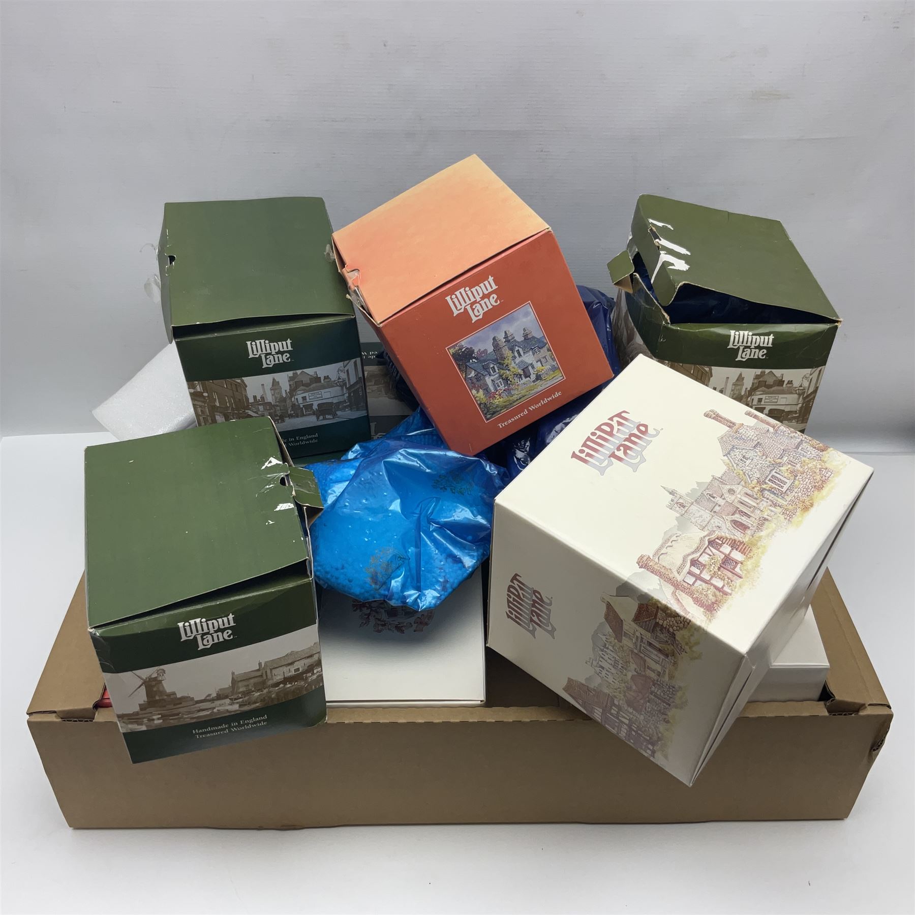 Ten Lilliput Lane models, to include Firemans Watch, The Rest House and Green Gables, Titmouse Cottage etc, all with deeds and original boxes (10)