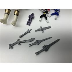 Collection of early 90s Mighty Morphin’ Power Rangers Zords, figures and accessories. Titanus the Carrier Zord, marked Bandai 1991; Green Dragonzord, incomplete; 1994 White Tigerzord with original instruction manual; 1993 Triceratops Dinozord, Mastodon Dinozord and Sabertooth Tiger Dinozord, Pterodactyl Dinozord, missing guns; with 1993 Power Morpher and original Power Coins, with further related figures, accessories and weapons