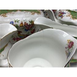 Paragon Rockingham pattern part tea and dinner service including three teapots, milk jug, cups and saucers of various sizes, ten soup bowls, ten side plates, ten dinner plates etc (96)