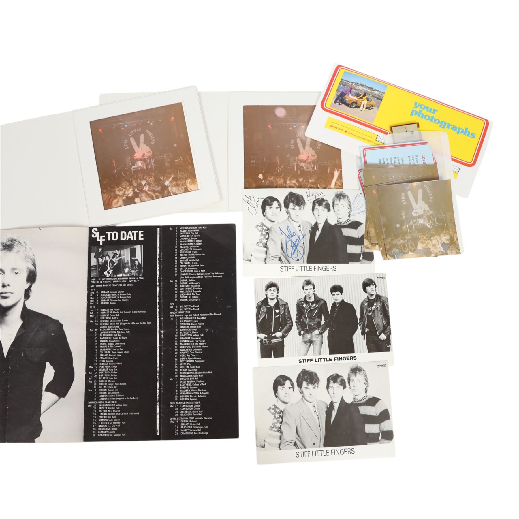 Signed Stiff Little Fingers promotional card, signed by four members of the band Jake Burns, Henry Cluney, Ali McMordie and Jim Reilly, two unsigned promotional cards,  'Go For It' 1981 tour programme and a collection of photographs from the gig